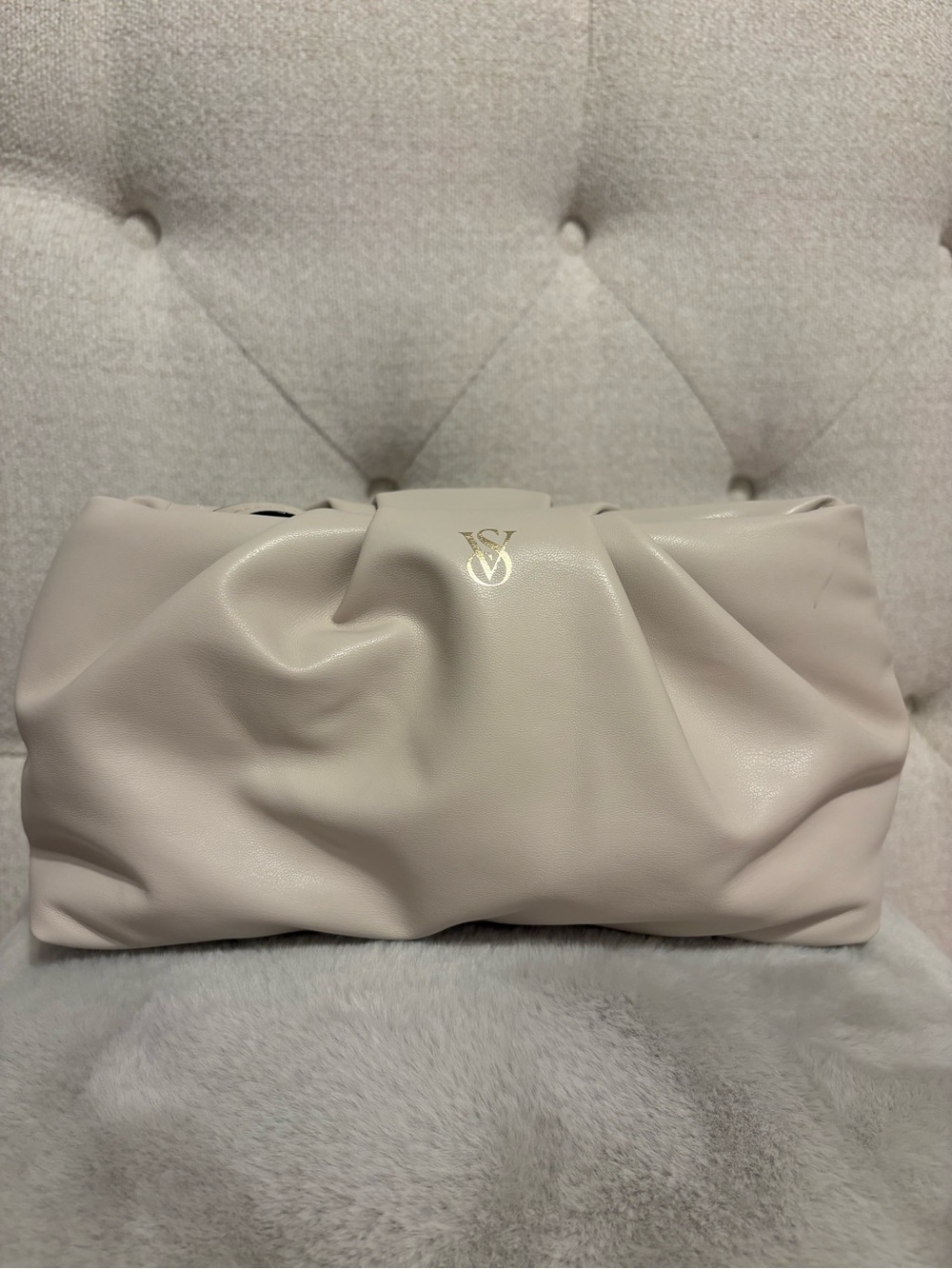 Victoria’s Secret creamy white puffy clutch